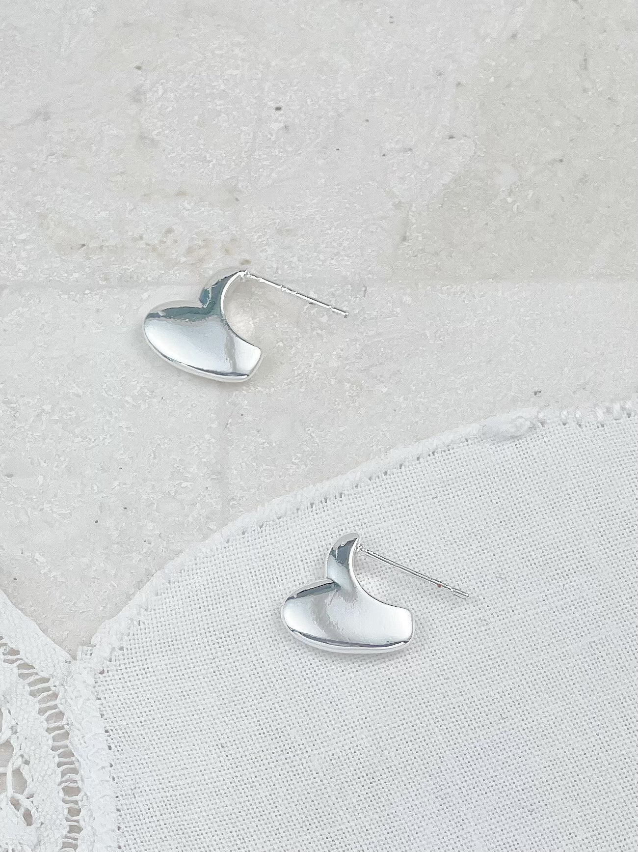 Silver Bitten Heart Stud Earrings