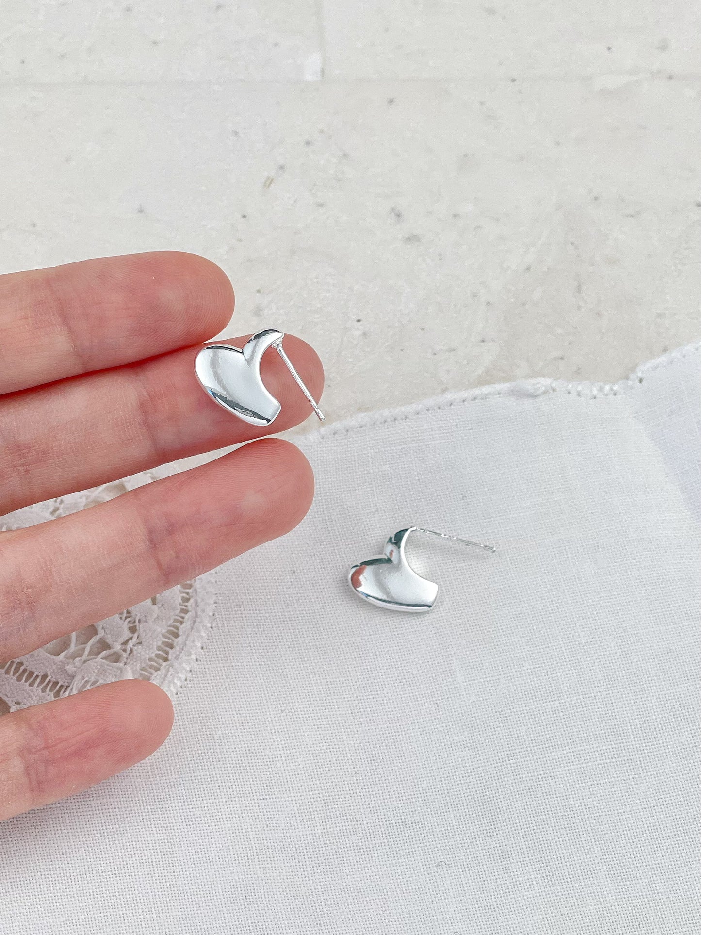 Silver Bitten Heart Stud Earrings